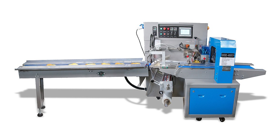 Горизонтальная упаковочная машина Hualian Machinery DXDZ-450XV с вакуумом (3 сервопривода, насос 100 м3/ч, лент. 200 мм, мин пакет Д-130 мм, макс. В-100 мм)