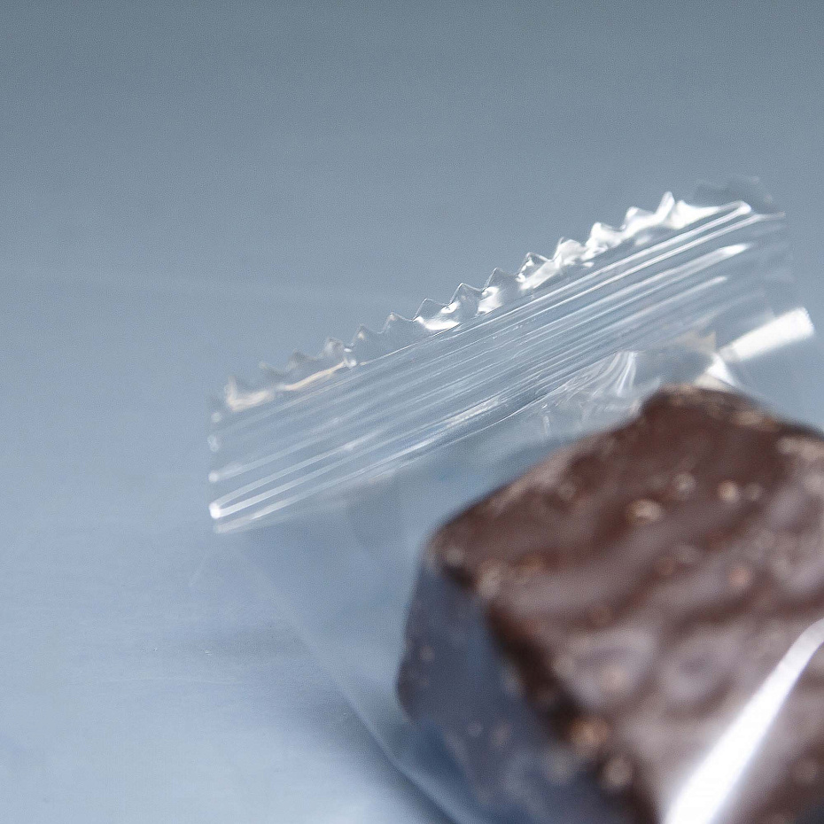 Горизонтальная упаковочная машина Hualian Machinery DXDZ-250B (нерж, сенсорная панель)