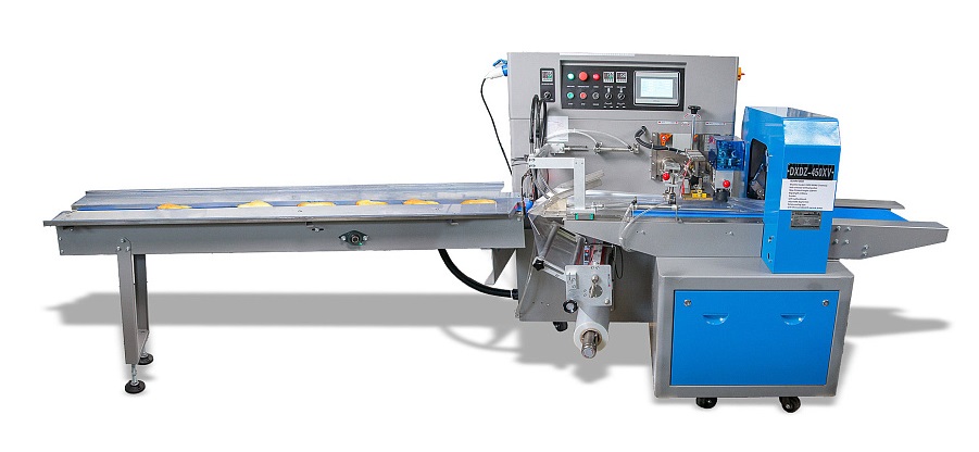 Горизонтальная упаковочная машина Hualian Machinery DXDZ-450XV (нерж.) с вакуумом (3 сервопривода, насос 100 м3/ч, лент. 200 мм, мин. пакет Д-130 мм, макс. В-100 мм)